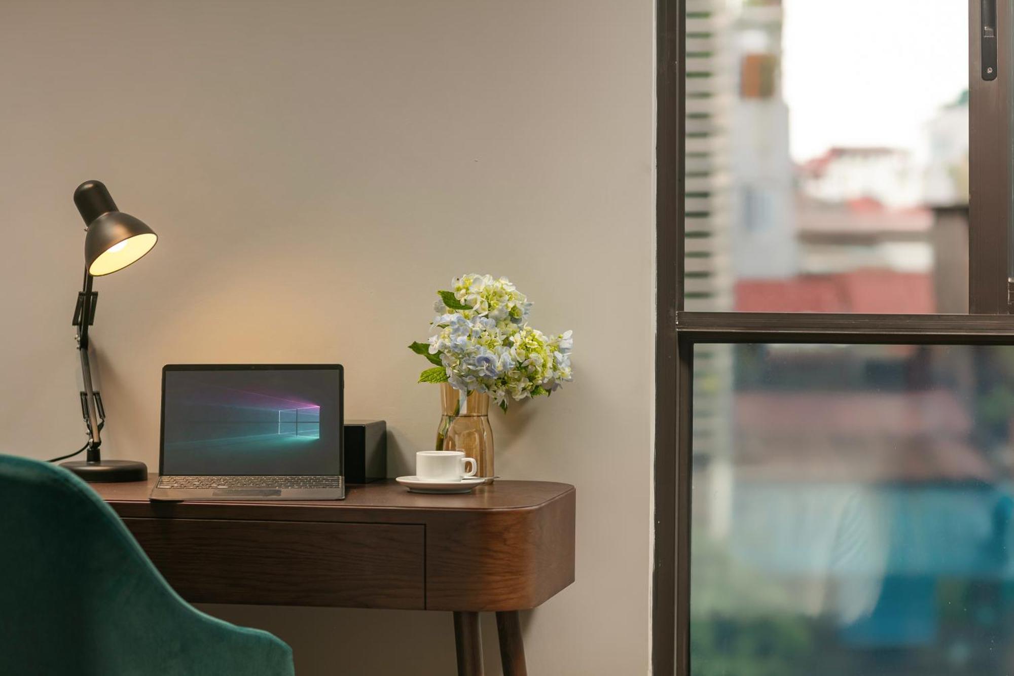 May De Ville Lakeside Hotel Hanoi Exterior photo A Microsoft Surface Pro 4